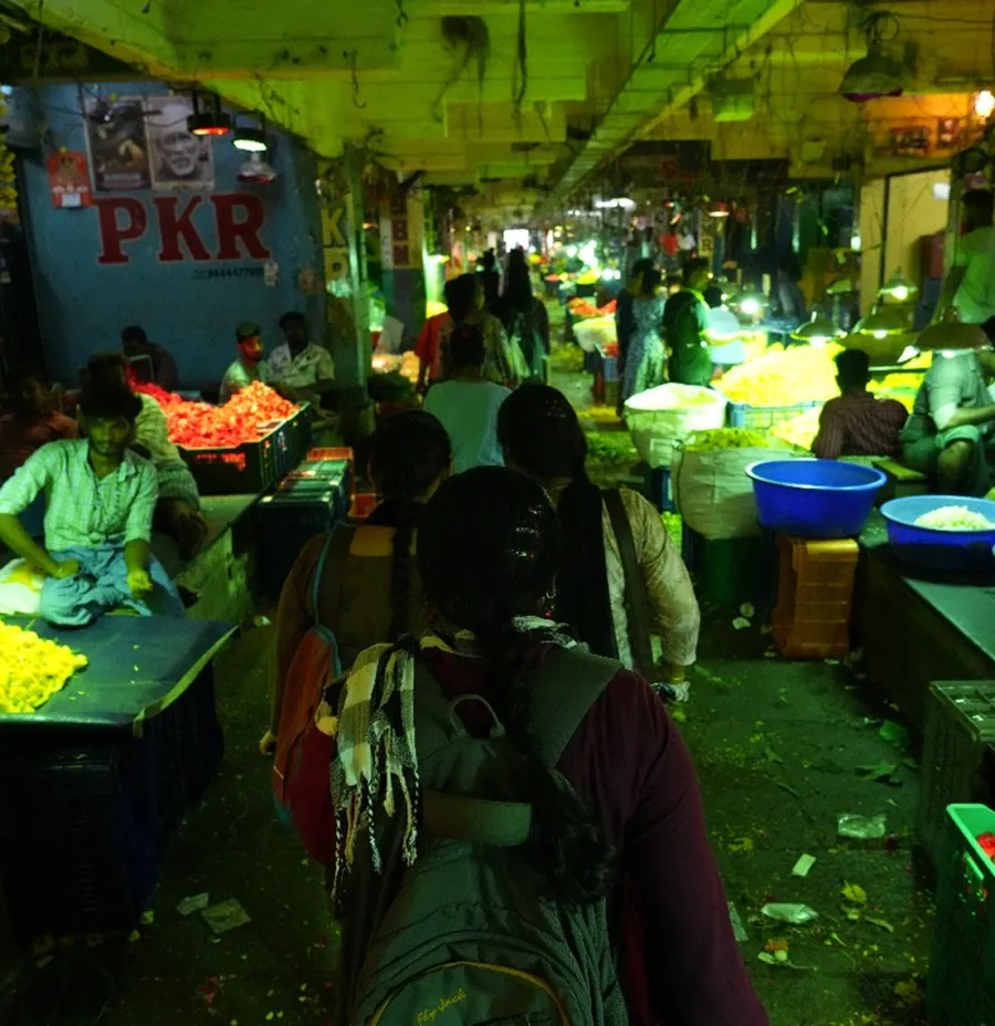 Vendors and produce at Koyambedu wholesale market